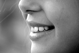 grayscale photo of woman lips