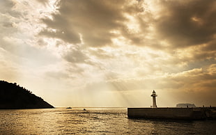 lighthouse during sunset HD wallpaper