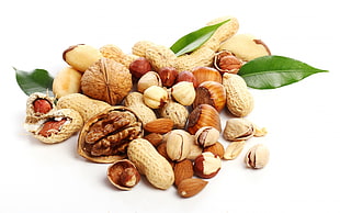 variety of nuts on white surface HD wallpaper
