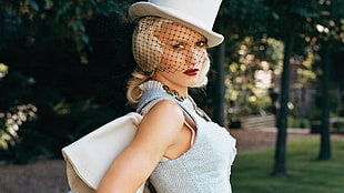 Woman wearing white hat