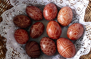 ten brown easter eggs in basket