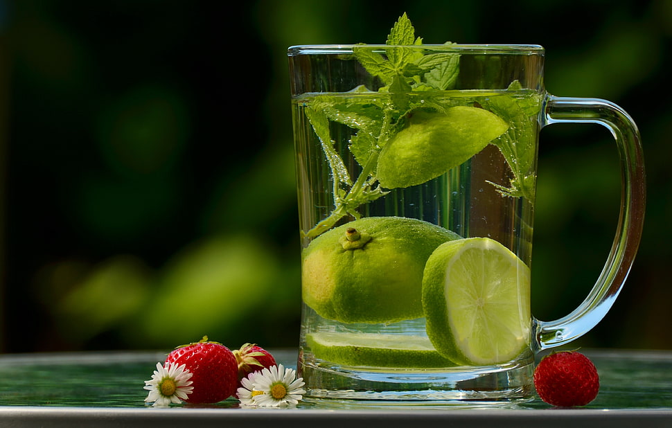 clear glass pitcher with green fruit HD wallpaper