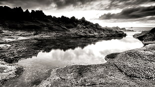 body of water and rock formations, monochrome, river, hills, rock