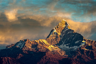 Mountain peak during golden hour HD wallpaper