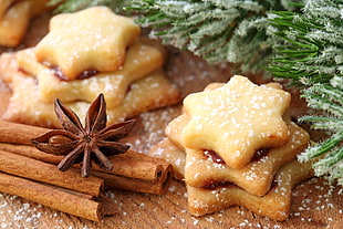 star cut cookies on brown wooden table HD wallpaper