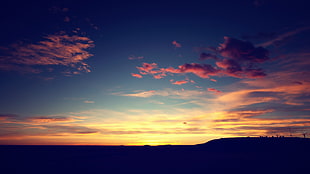 silhouette of mountains during golden hour HD wallpaper