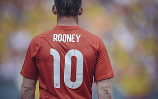 photo of man in Rooney 10 jersey shirt