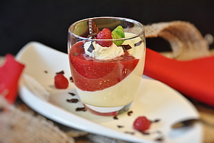 shallow focus photography of red strawberry shake