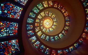 brown spiral stair, stained glass