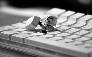 Storm Trooper toy on computer keyboard, keyboards, Star Wars, stormtrooper, monochrome