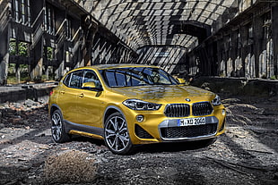 yellow BMW 5-door hatchback