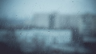 raindrop on glass window HD wallpaper