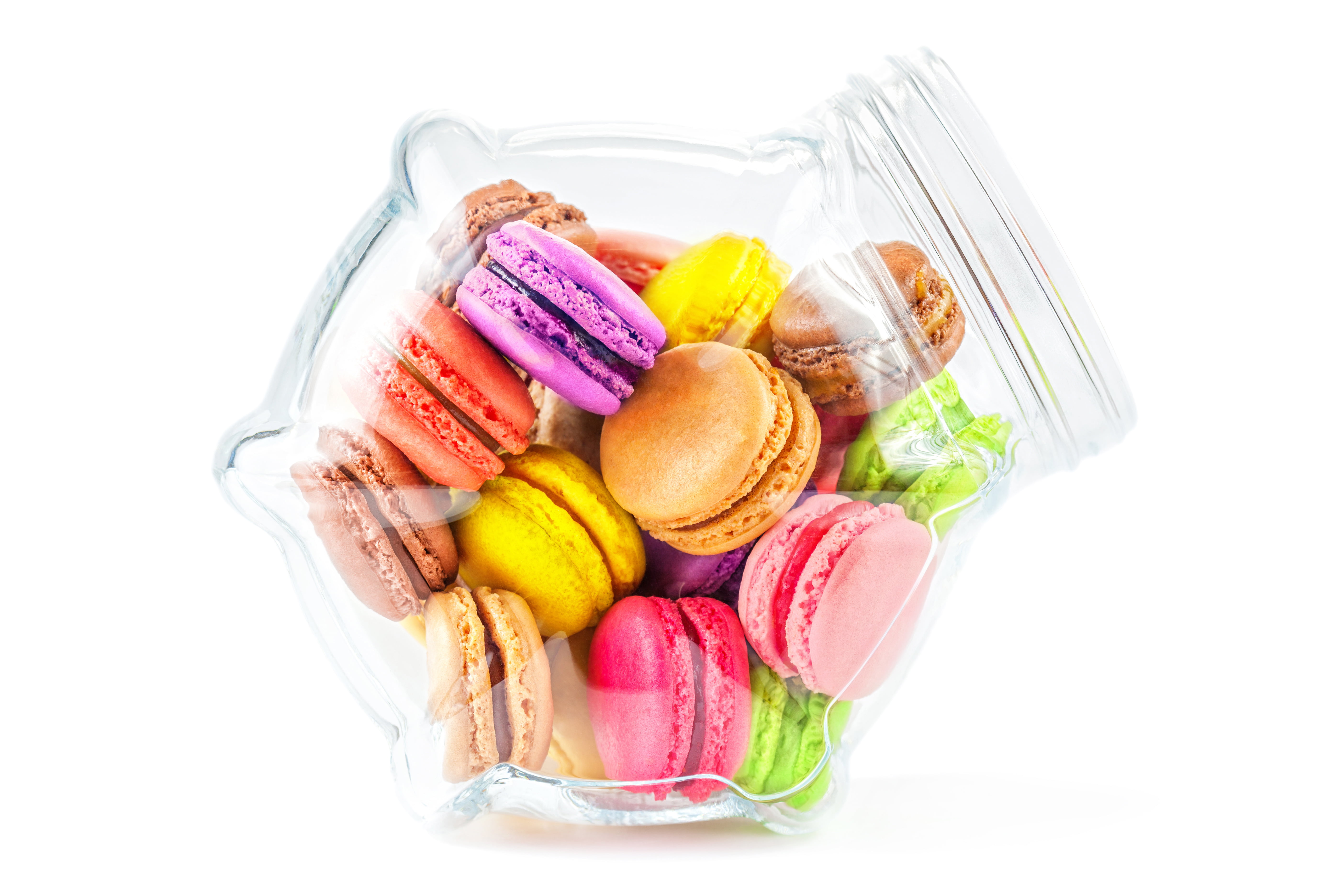 assorted color macaroons on clear glass jar