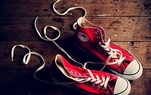 shallow focus photography of red Converse All Star high-top sneakers HD wallpaper