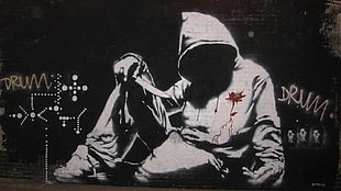 person wearing hooded jacket painting, graffiti