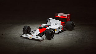 white and red RC toy car