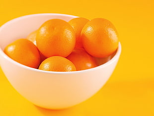 orange fruit on white ceramic bol HD wallpaper
