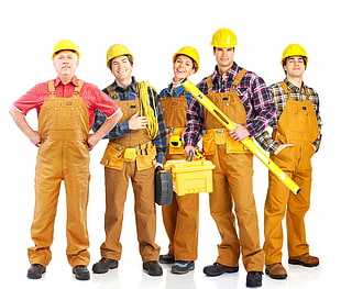 five people wearing yellow hard hats