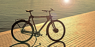 mountain bike beside body of water HD wallpaper
