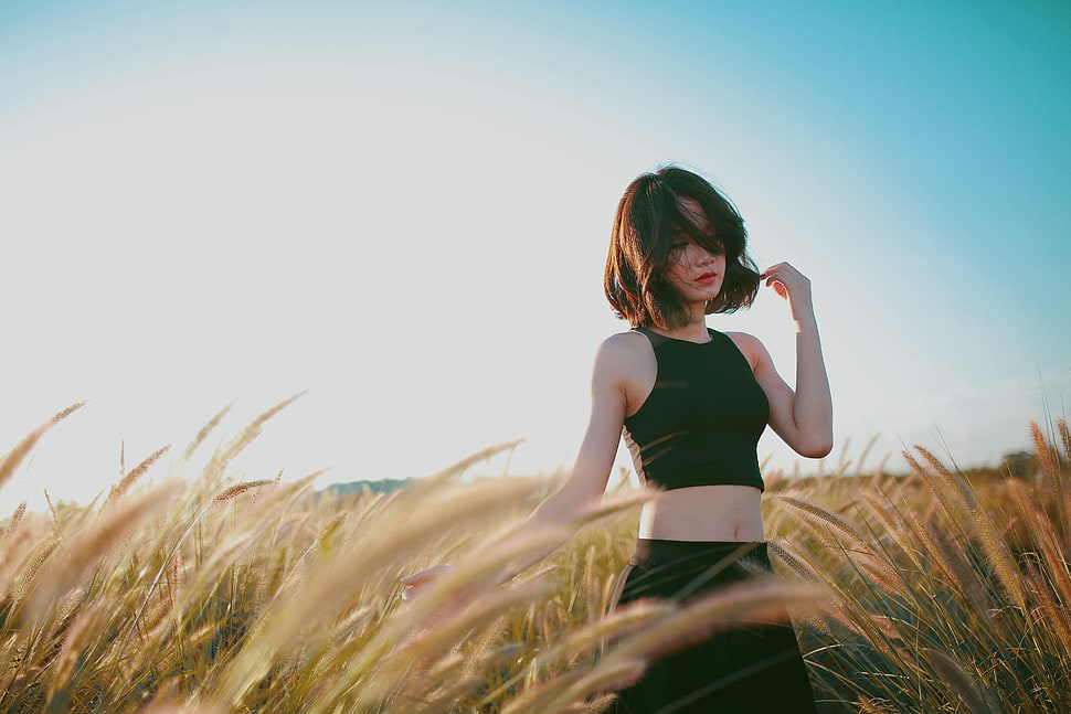 woman in black crop top in field during daytime HD wallpaper