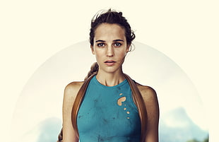 woman wearing blue tank top