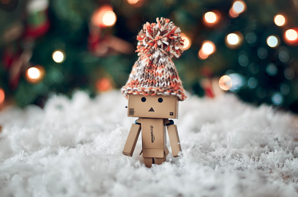 brown paper doll on white textile HD wallpaper