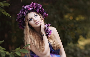 woman wearing purple headdress