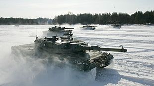 black battle tanks during daytime