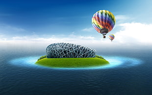 hot air balloon near island