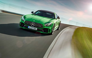 green Mercedes-Benz AMG GT on race track HD wallpaper