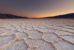 photo of dried ground during golden hour, badwater basin, death valley national park