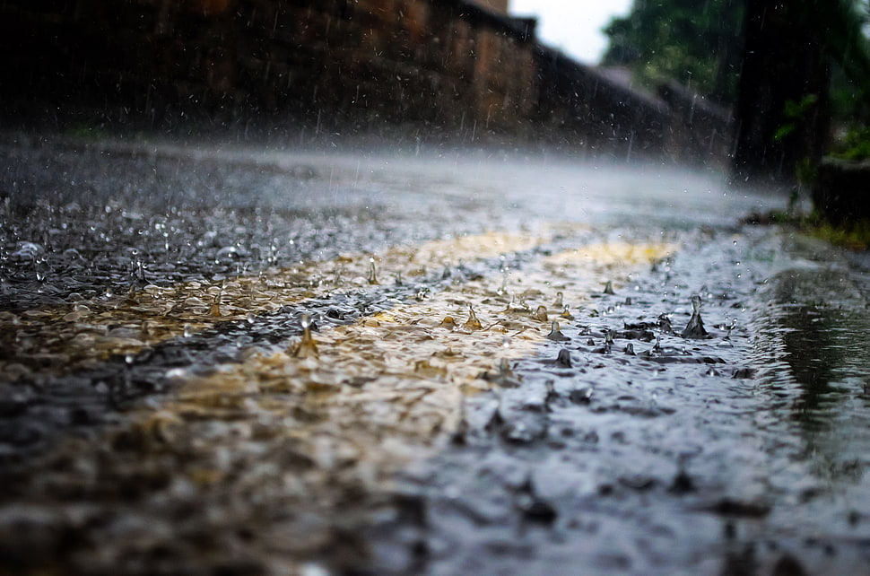 raindrops on concrete floor time lapse photo HD wallpaper