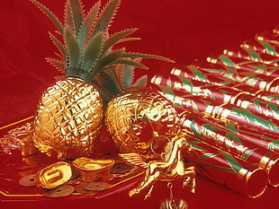 two gold-colored pineapple decors HD wallpaper