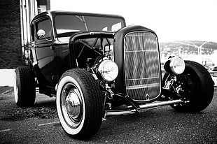 grayscale photo of a classic vehicle