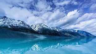 landscape photography of body of water beside mountain during daytime, mountains, blue, nature, sky