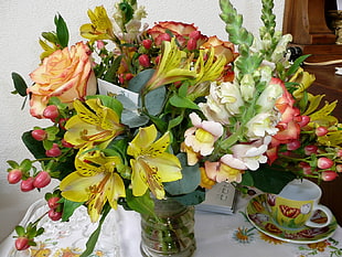 pink, white, and yellow Rose and Peruvian Lily flower bouquet