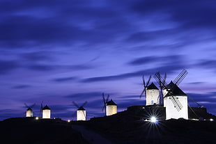 black windmills during night time