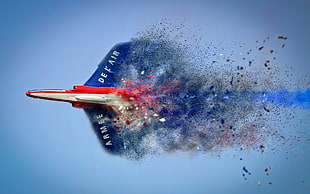 blue and red fighter jet leaving smoke on sky, air, aircraft