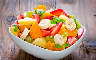 white ceramic bowl with assorted fruits