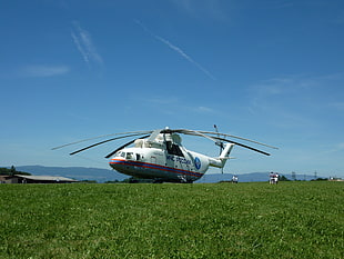 white and gray helicopter on greenfield during daytime HD wallpaper