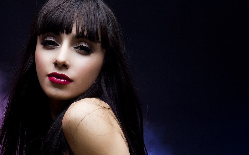 woman with black hair posing for a photo HD wallpaper