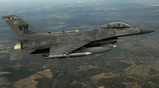 SW 20 fighter jet flying during daytime