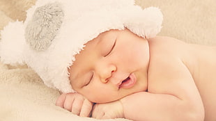 baby's white fleece cap, baby, sleeping