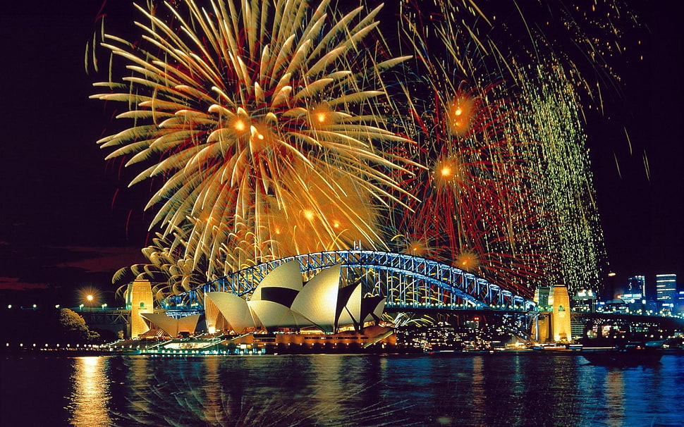 Fireworks display near Sydney Opera House during nighttime HD wallpaper