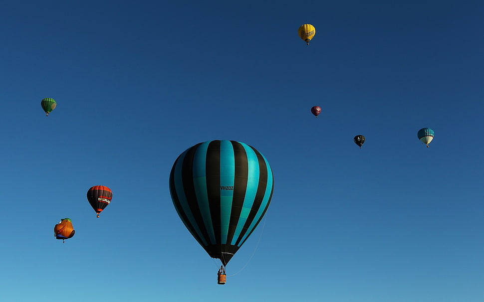 teal and black stripe hot air balloons during daytime HD wallpaper