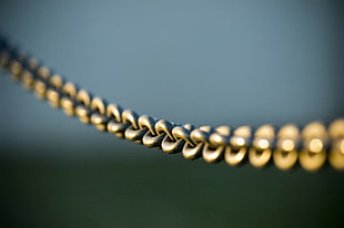 gold-colored chain link