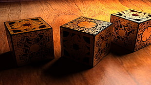 three cube-shaped brown-and-black decors, cube, Hellraiser, Lemarchand's box, movies
