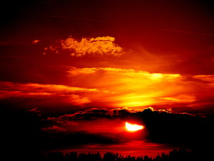 silhouette of clouds during sunset