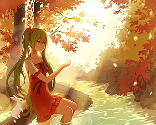 green-haired female anime character sitting beside rabbit