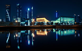 teal and yellow buildings, city, cityscape, Kuwait, night